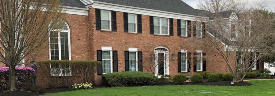 New Jersey home with freshly painted exterior and white trim